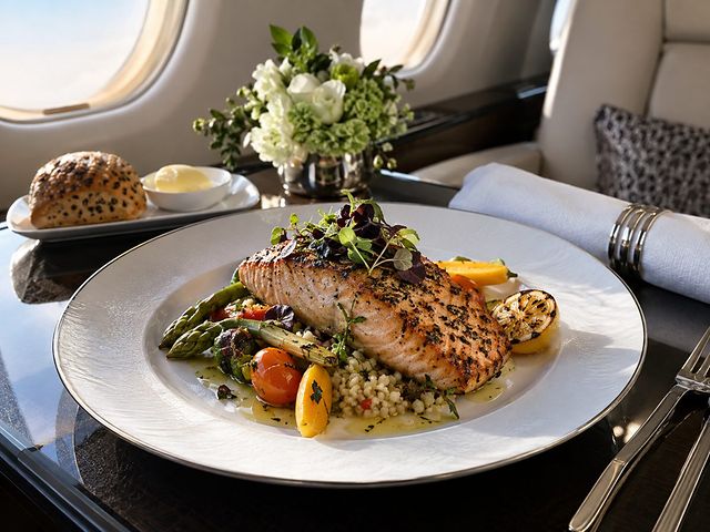 Seared salmon plated in the cabin